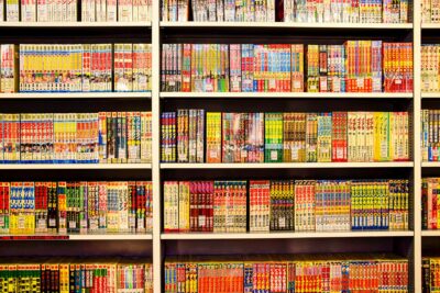 Vibrant shelves filled with Japanese manga in a bookstore. Perfect for comic enthusiasts.